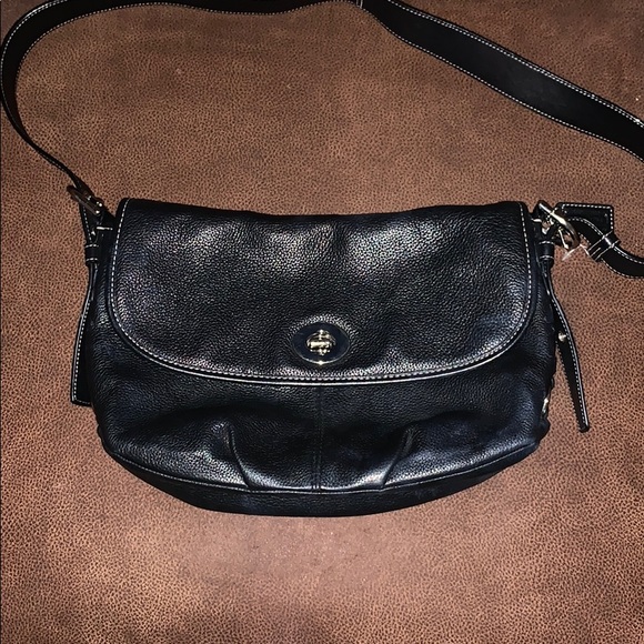 Coach Handbags - Coach Black Flap top convertible duffel.